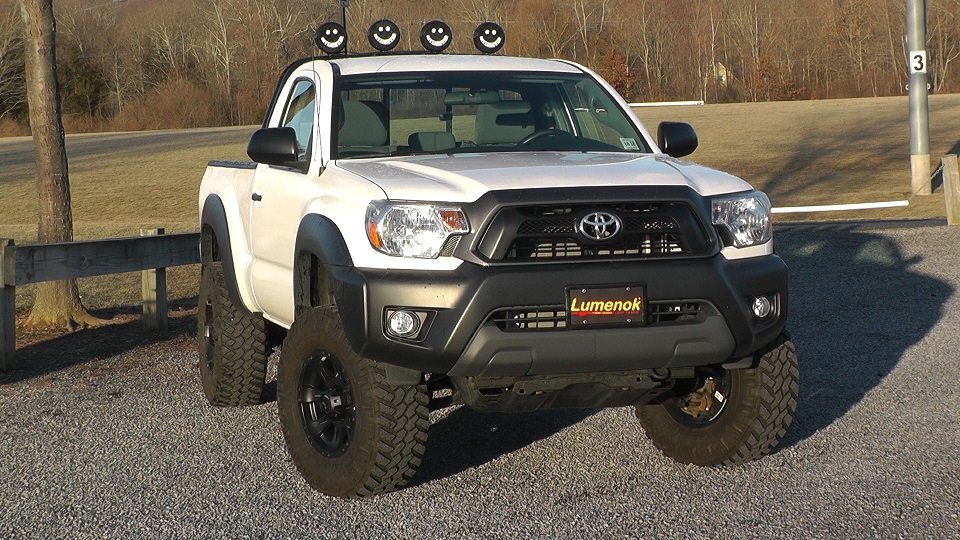 Toytec 3" Boss Suspension, Sterling one piece double/single roll bar, Nitto Trail Grappler 285 70R16 on Raceline 16x8 Raptors.